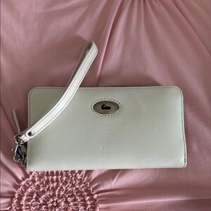 Dooney&Bourke cream leather wristlet wallet with smooth leather interior